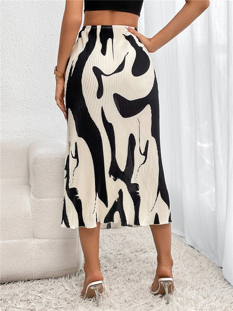 Eleganter Rock mit fließenden Falten, perfekt für einen raffinierten und femininen Look - Arlene