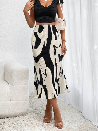 Eleganter Rock mit fließenden Falten, perfekt für einen raffinierten und femininen Look - Arlene