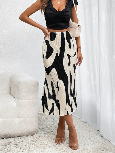 Eleganter Rock mit fließenden Falten, perfekt für einen raffinierten und femininen Look - Arlene