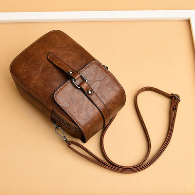 Damen-Umhängetasche aus Kunstleder mit kompakter Vordertasche - Daniela