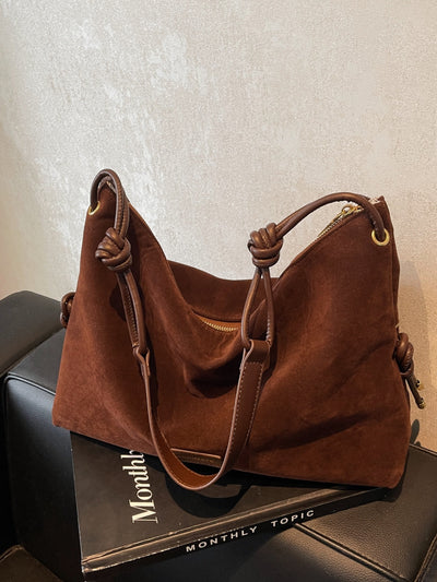Breite Handtasche aus Wildleder