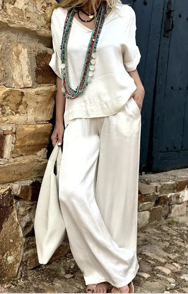 Leyna - Elegantes weißes Oberteil mit V-Ausschnitt und weitem Hosenbein